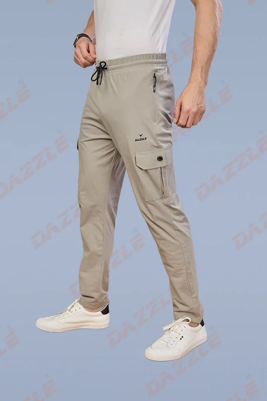 Beige cargo pants worn by a person on a light blue background with 'Gazley' branding.