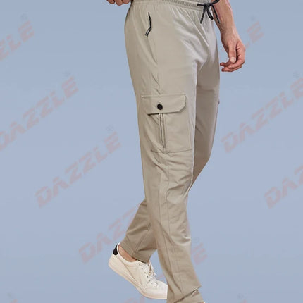 Beige cargo pants worn by a person on a light blue background with 'Gazzle' branding.