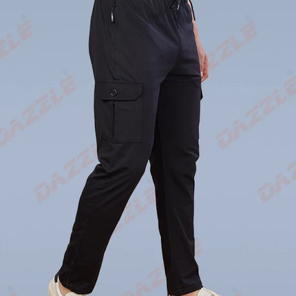 Person wearing black cargo pants on a light blue background with 'Gazelle' branding.